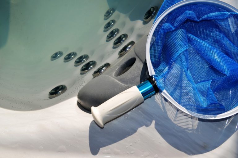 a net next to a hot tub
