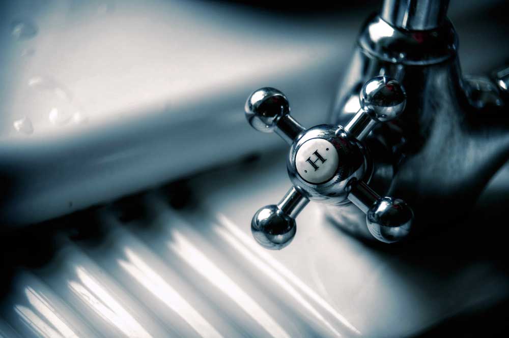 a tap with the letter H on it