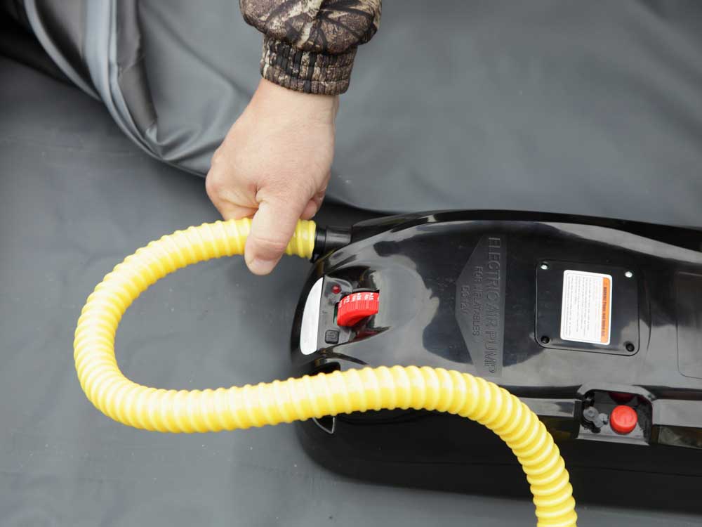 someone connecting a pump