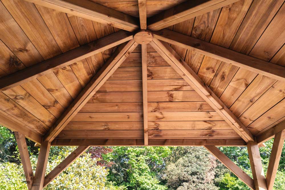 a wooden garden shelter