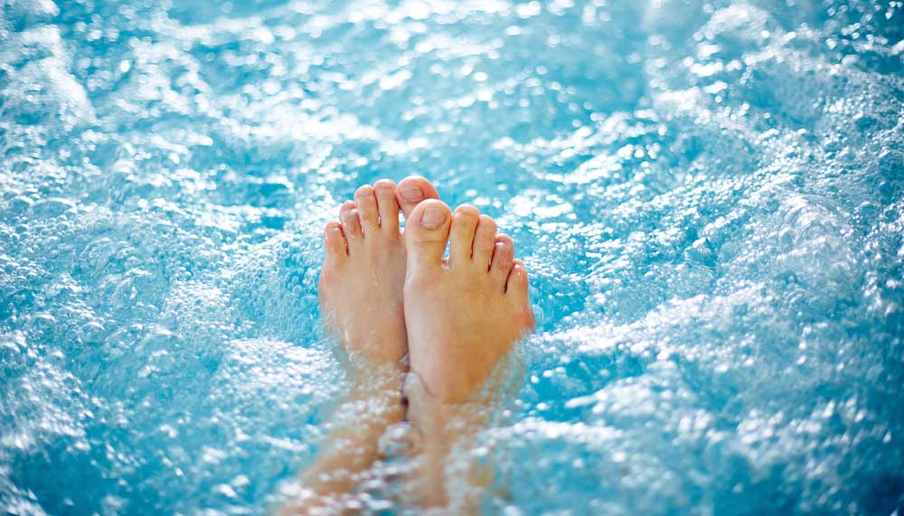 a pair of feet in water